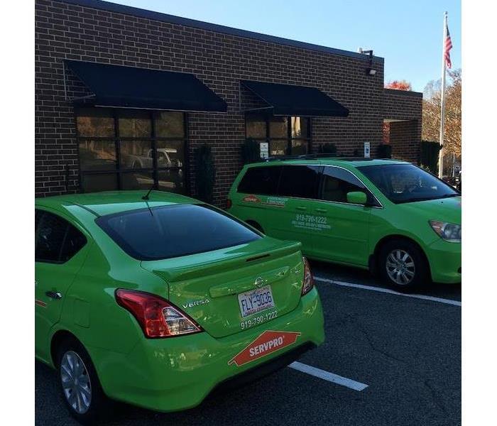 SERVPRO vehicles in a parking lot