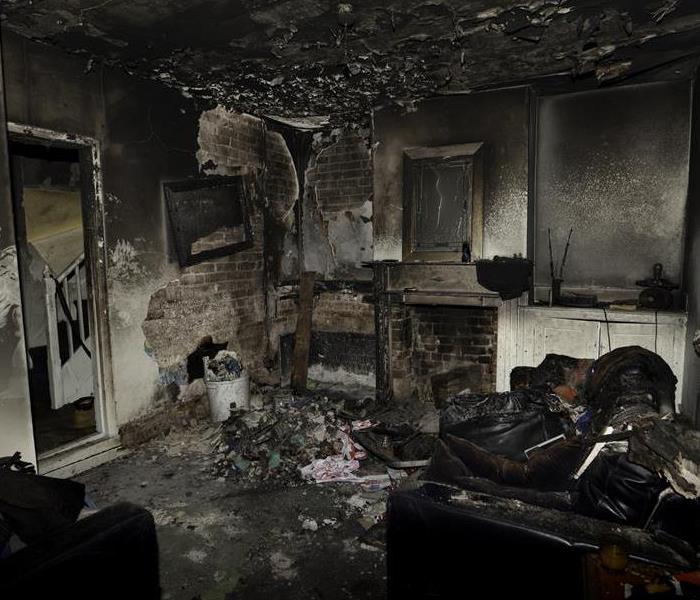 fire and soot damage to a living room
