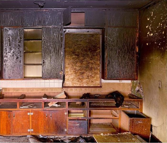 charred and smoke damaged kitchen cabinets